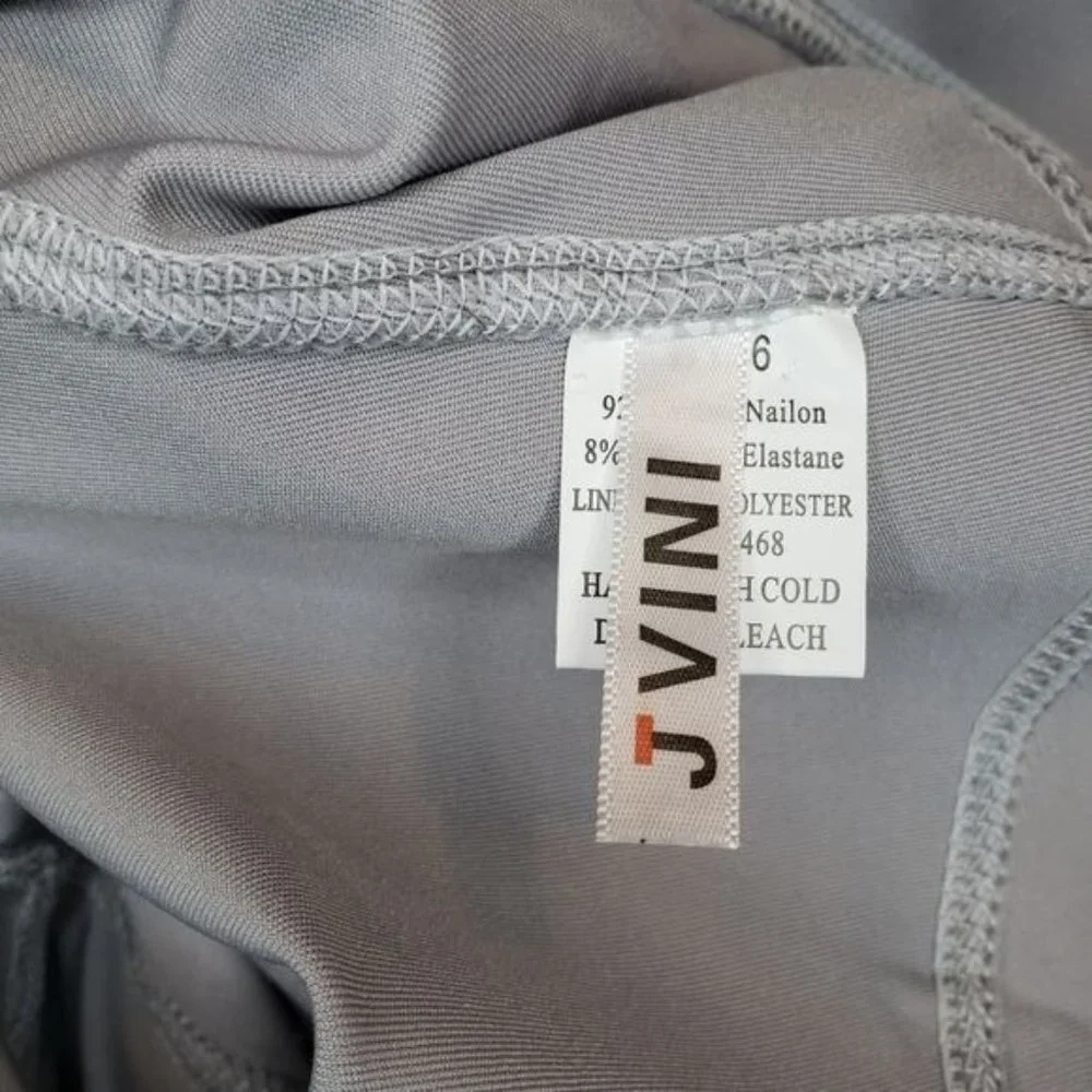 NWT JVINI gray leggings with sheer‎ side pa…